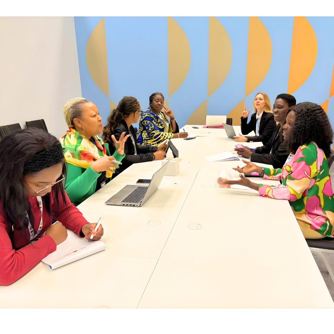 People gathered around a table for a discussion